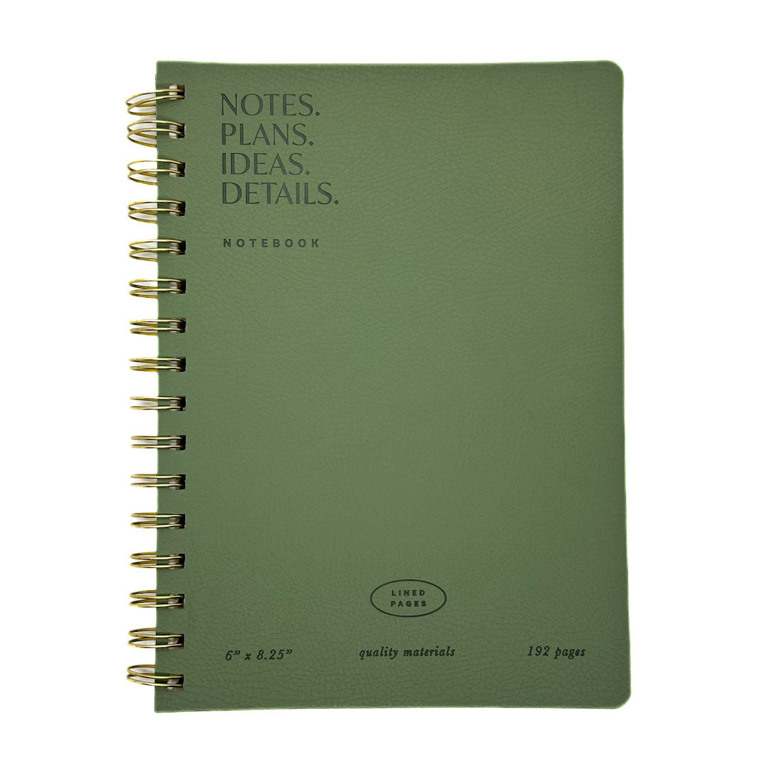 Fringe Studio A5 green notebook with gold spiral binding on a white background