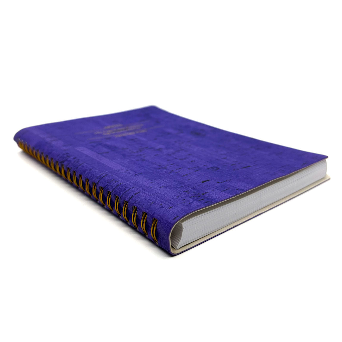 Purple notebook with gold spiral binding on a white background