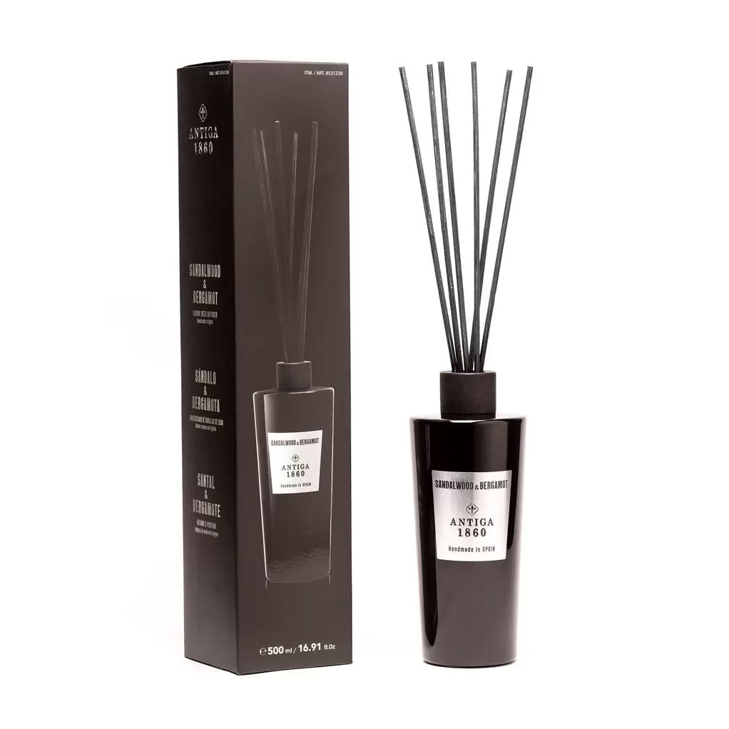 Antiga 1860 Sandalwood & Bergamot Black diffuser bottle with sticks and packaging on a white background