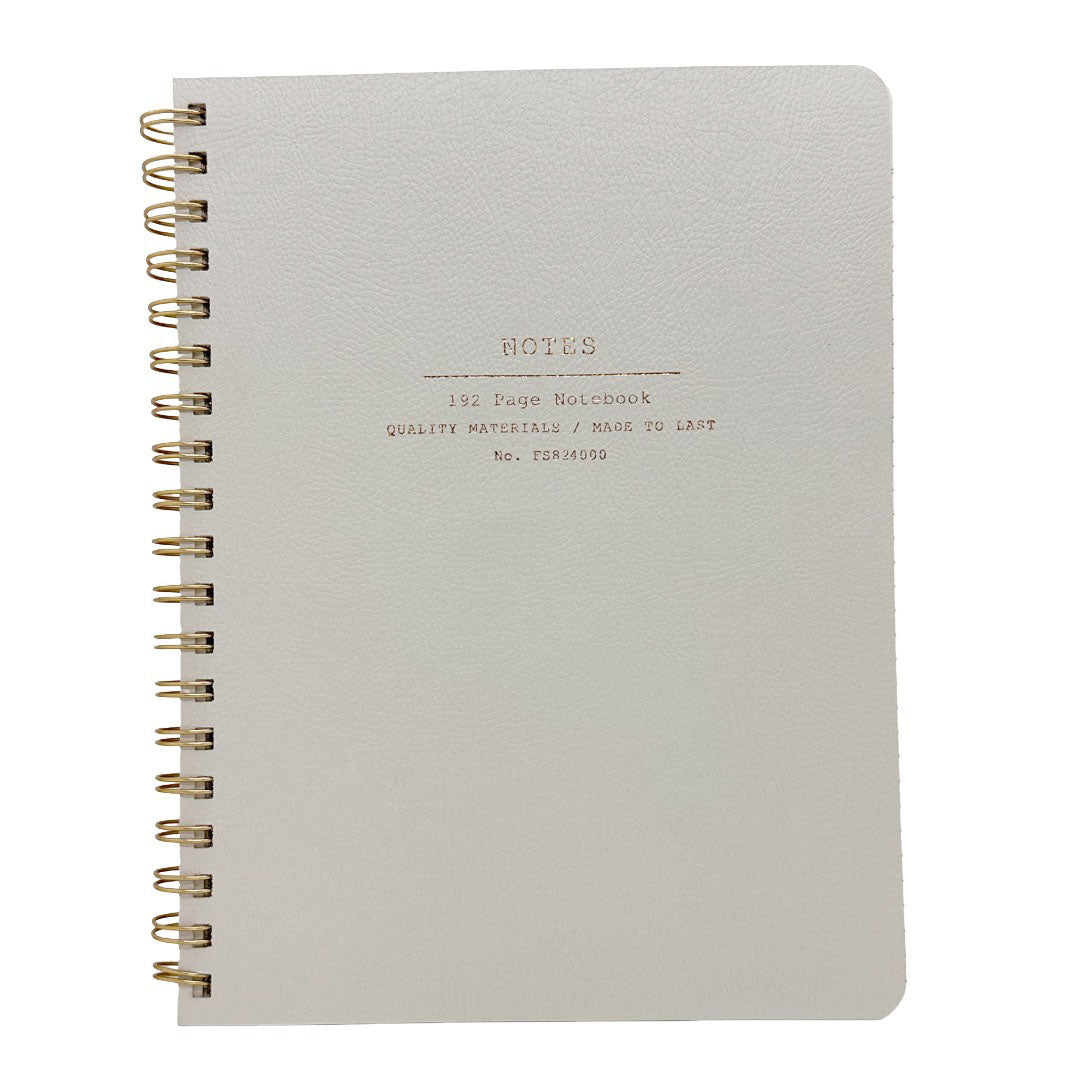 A 192-page Fringe Studio notebook with a textured warm grey cover and a gold-tone spiral binding, shown on a plain white background.