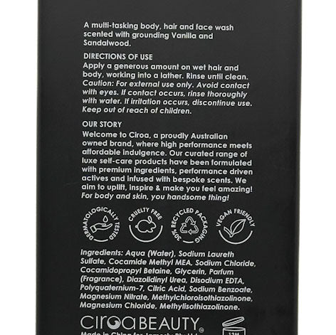 The back of a black Clciroa Vanilla and Sandalwood body, hair, and face wash bottle showing detailed product information, ingredients, and certification logos in white text.