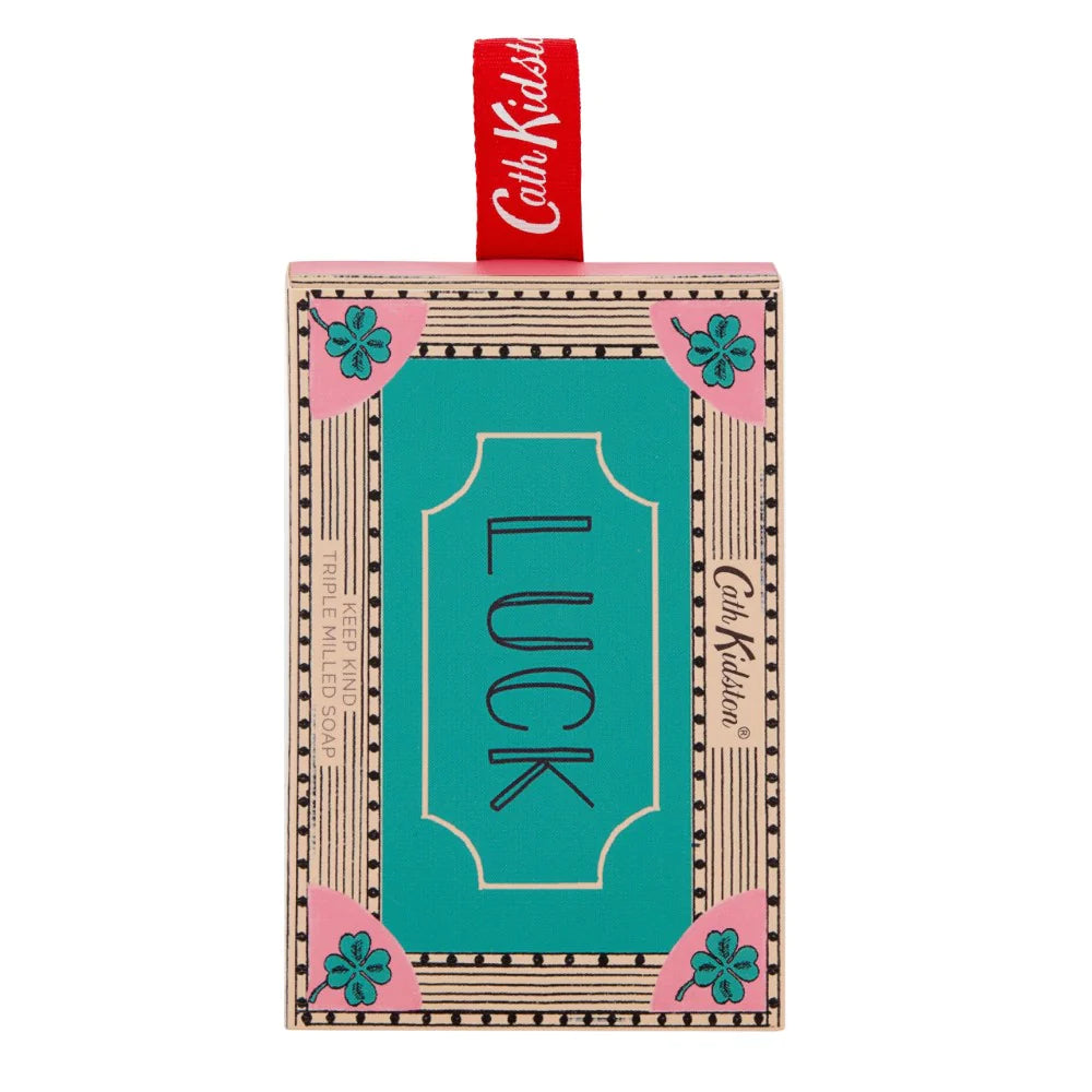 Cath Kidson soap designed as a decorative card with 'LUCK' text and decorative elements on a white background