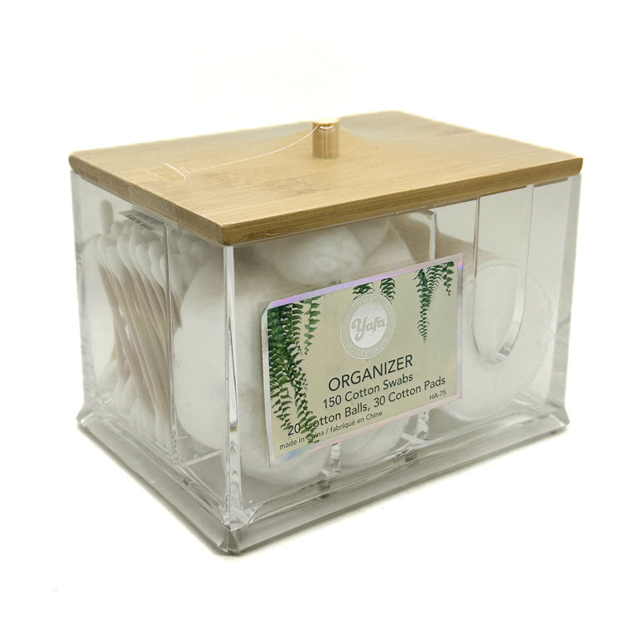 Clear organiser with wooden lid containing cotton swabs and balls, on a white background