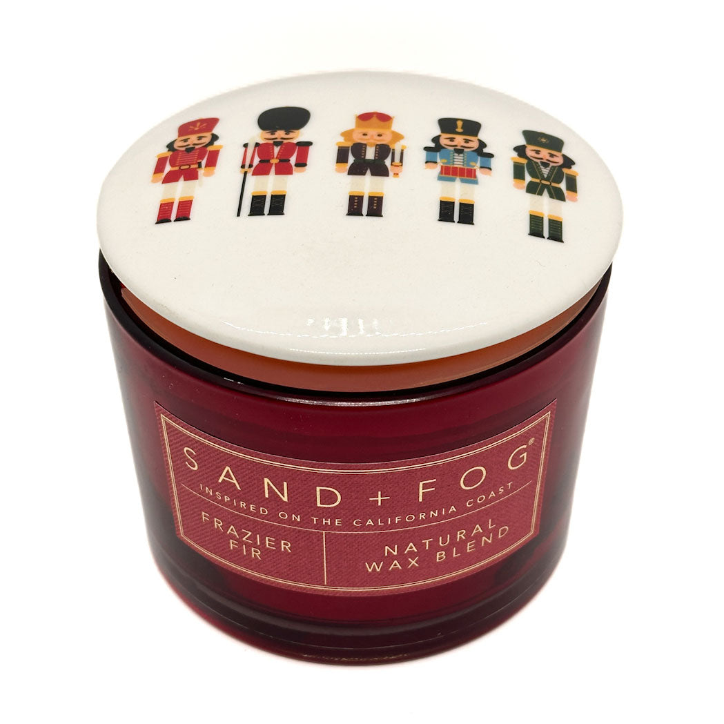 Frazier Fir Scented candle by SAND + Fog with nutcrackers on the lid