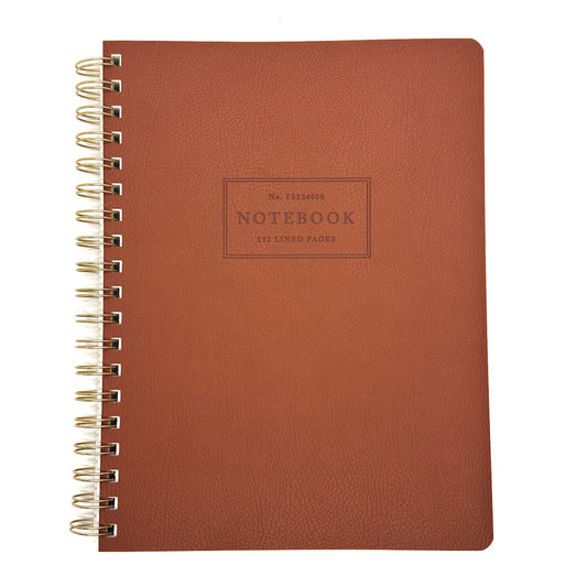 Brown notebook with gold spiral binding on a white background