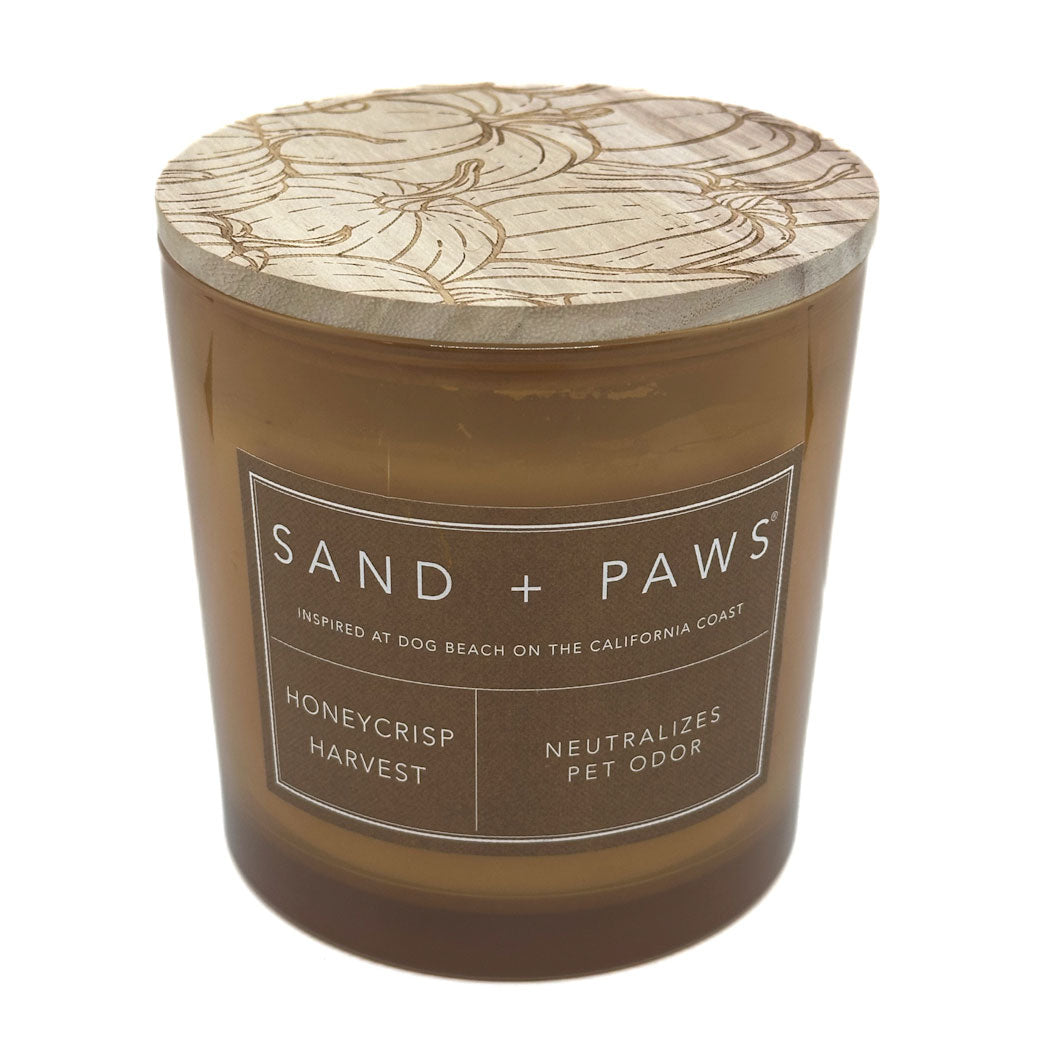 SAND + PAWS Honeycrisp Harvest brown candle with pumpkin illustrations on wood lid