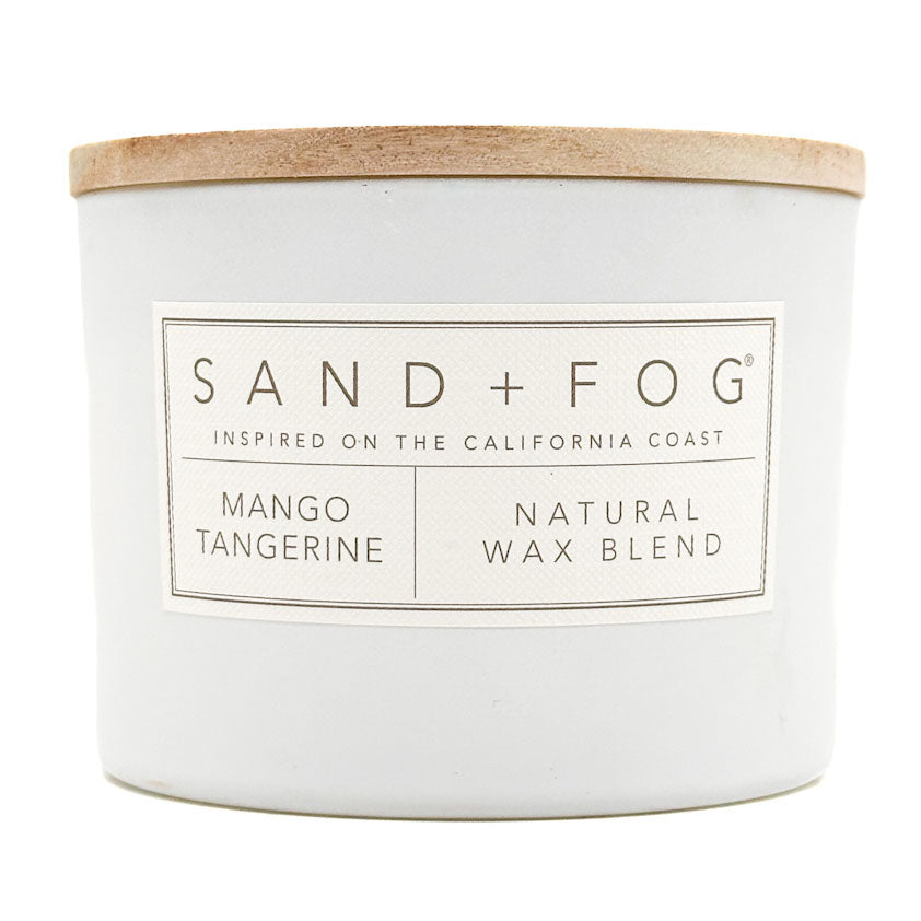 Mango Tangerine White Candle with 'Sand + Fog' label on a white background