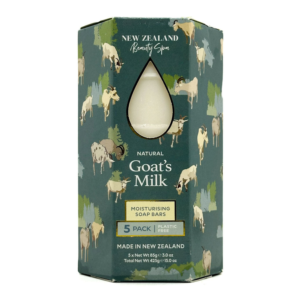 Packaging of New Zealand Beauty Spa's goats' milk soap bars with cow illustrations on a green background.