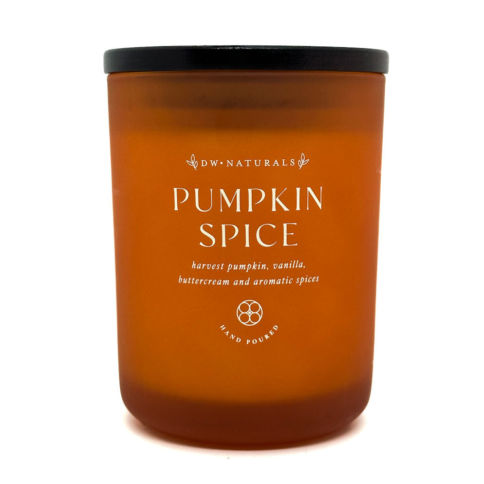 DW Home amber candle jar with 'Pumpkin Spice' label on a white background