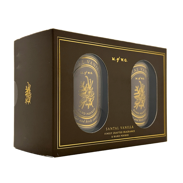 Two MWG candles in a decorative box labeled 'Santal Vanilla' on a white background.