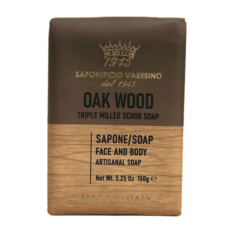 Saponificio Varesino Bar of wood scrub soap with brown top and wooden bottom on a white background