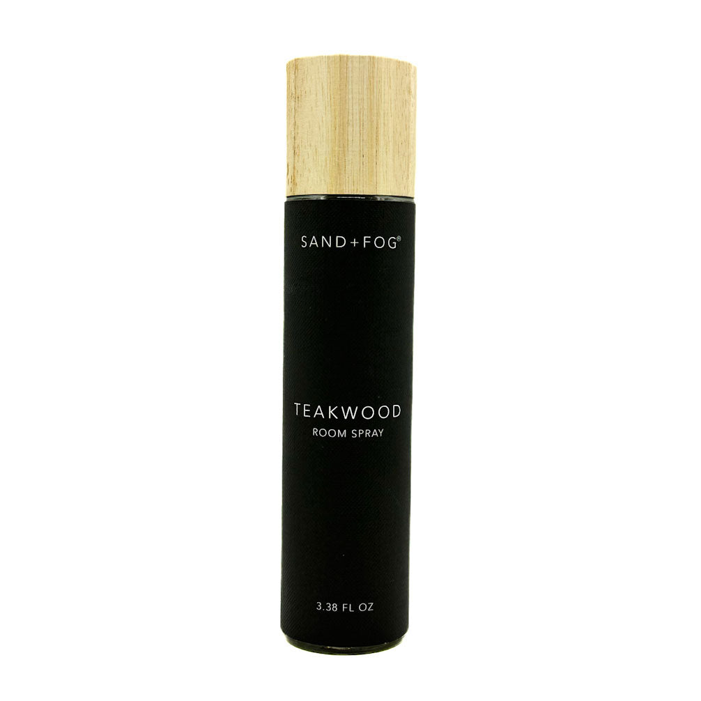 SAND + FOG Teakwood black room spray bottle with a wooden cap on a white background
