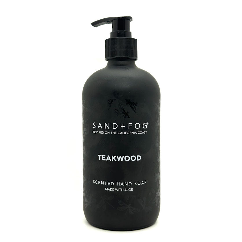 Black bottle of Sand + Fog Teakwood scented hand soap on a white background