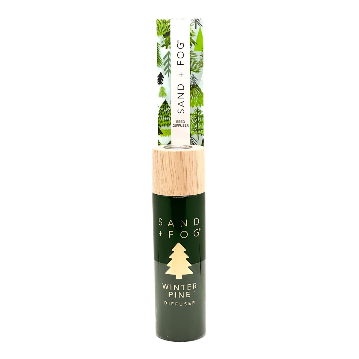 Winter Pine Diffuser bottle by SAND + FOG with green label and wooden cap on a white background