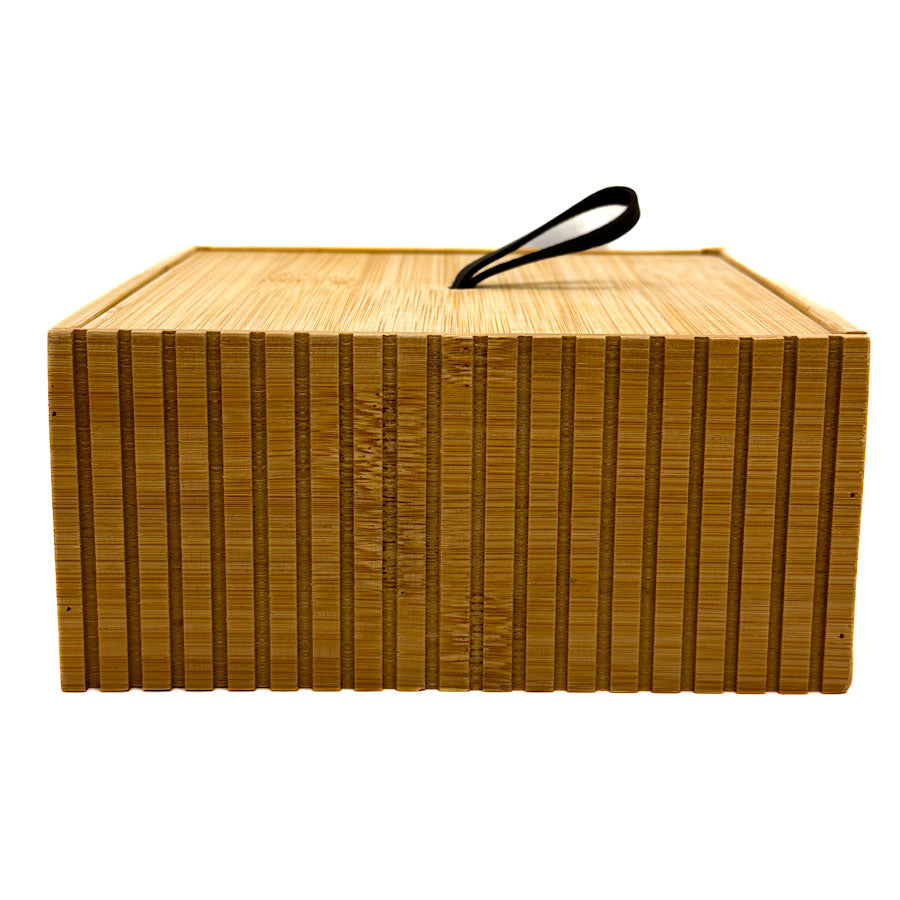 Bamboo box with a handle on a white background