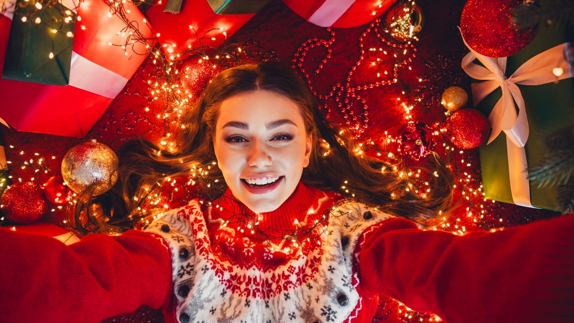 A woman enjoying the fragranced candle