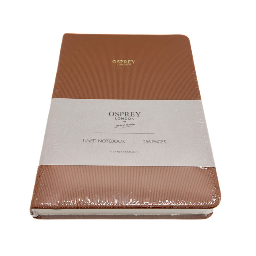 Brown Osprey London notebook with a white label on a white background