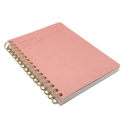 Fringe Studio A5 Pink notebook with gold spiral binding on a white background
