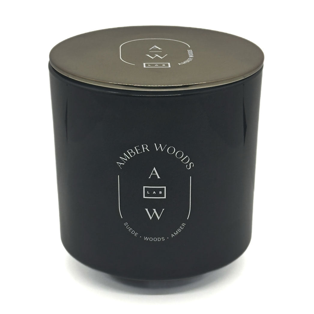 Amber Woods candle by LAB in a black container