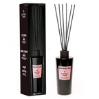Antiga 1860 Velvet Orchid & Rose reed diffuser shown with its black packaging box and the diffuser bottle with reeds on a white background.