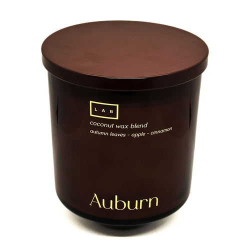 Brown Auburn LAB candle jar with lid on a white background