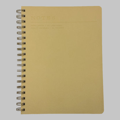 Fringe Studio yellow notebook with spiral binding on a grey background