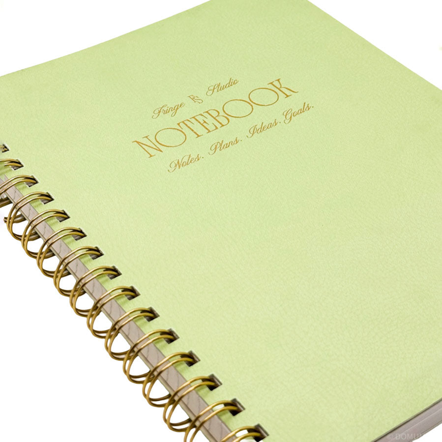 Fringe Studio light green notebook with gold spiral binding on a white background