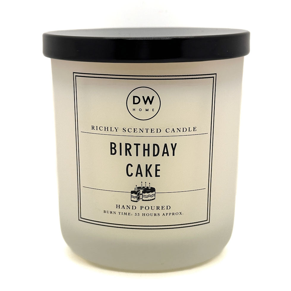 Birthday Cake white candle with black lid and 'DW Home' label on a white background