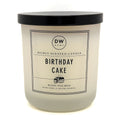 Birthday Cake white candle with black lid and 'DW Home' label on a white background