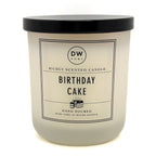 Birthday Cake white candle with black lid and 'DW Home' label on a white background
