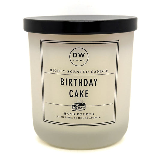 Birthday Cake white candle with black lid and 'DW Home' label on a white background