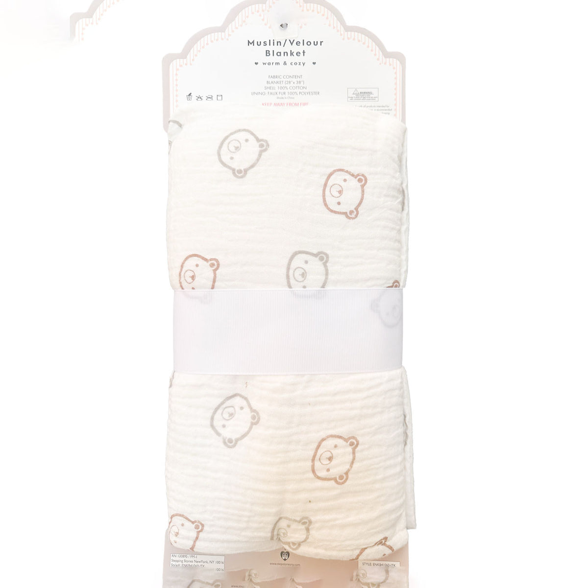 A folded muslin/velvet baby blanket with a cute teddy bear face pattern, packaged in its original retail card packaging with a white paper band around the middle.