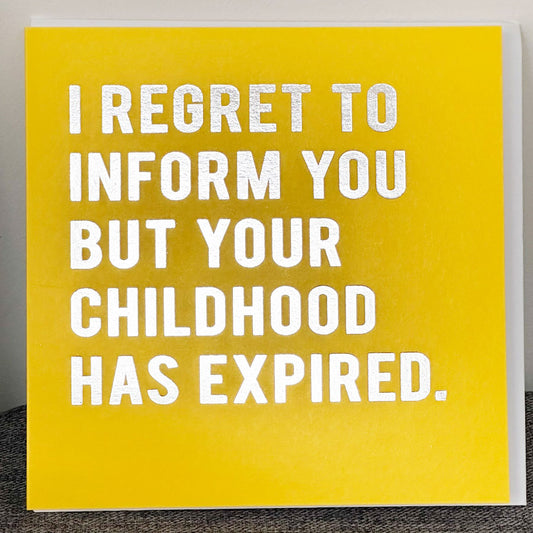 Yello Greeting Card with the wording 'I Regret To Inform You But Your Childhood Has Expired'.