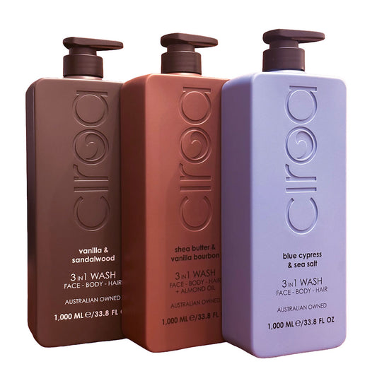 Bottles of Ciroa 3-in-1 wash in different scents on a white background