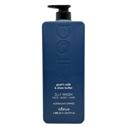 A dark blue rectangular bottle of ecoPure Ciroa goat's milk & shea butter 3 in 1 Wash with a black pump dispenser, shown against a plain white background.