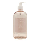 Hand soap bottle labeled 'Sand + Fog California Beach House' on a white background