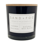California Beach House Candle with a label reading 'Sand + Fog' on a white background