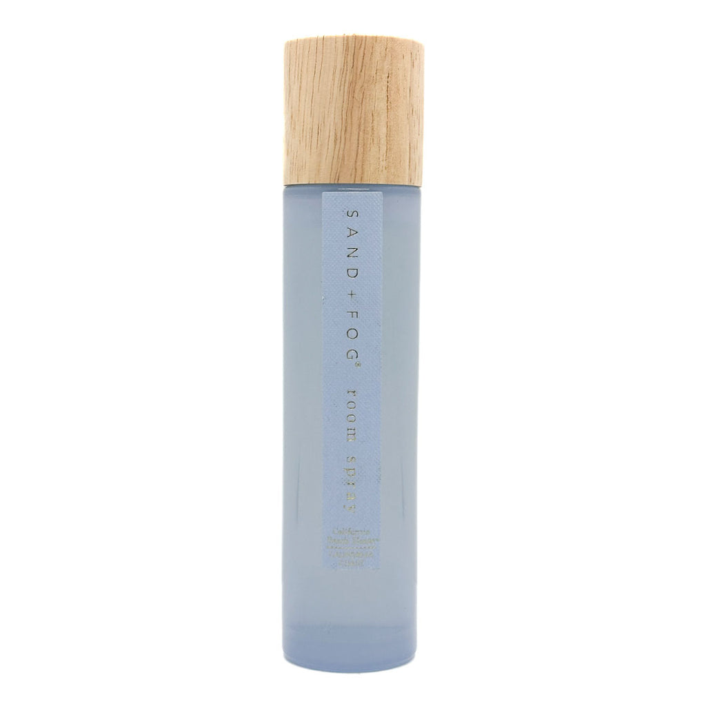 SAND + FOG California Beach House room spray bottle with wooden cap on a white background