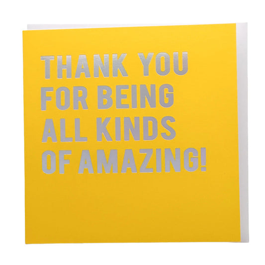 A square yellow greeting card with the phrase 'THANK YOU FOR BEING ALL KINDS OF AMAZING!' printed in light gray capital letters, shown against a plain white background.