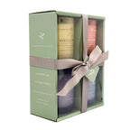 Charming Farmhouse set of four candles in a decorative box with a ribbon on a white background