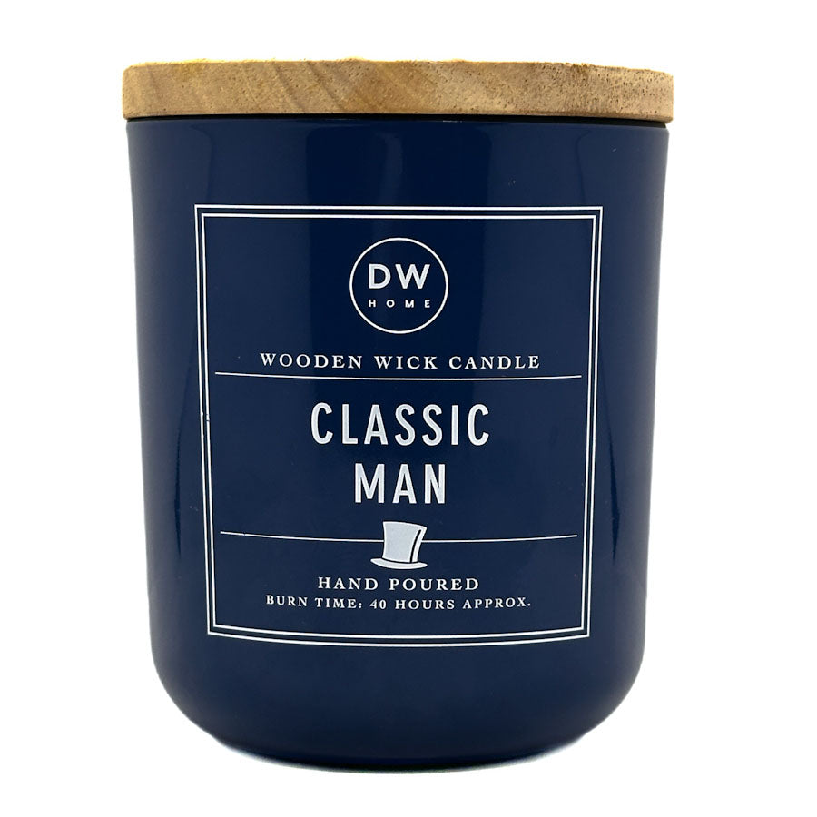 Navy blue candle with wooden lid labeled 'Classic Man' by DW Home on a white background