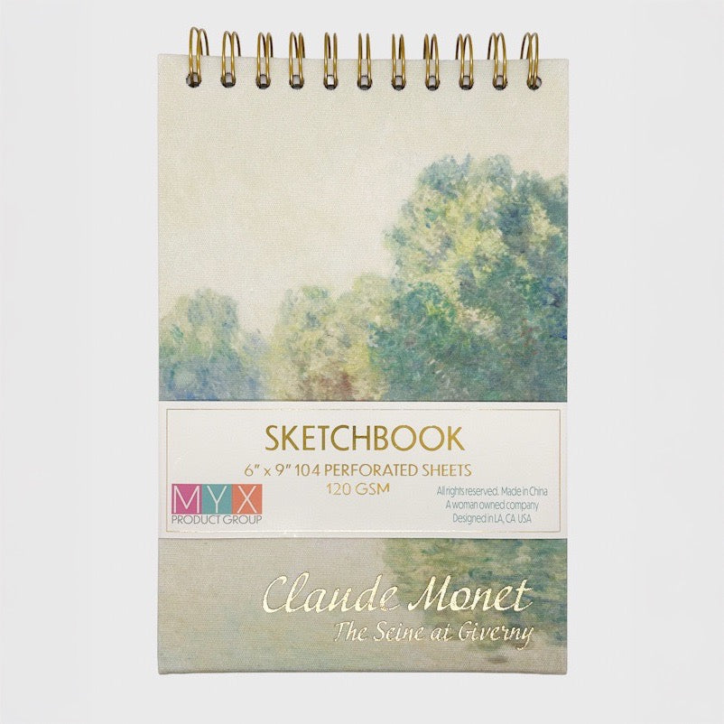 Sketchbook with a cover featuring a painting of trees by Claude Monet on a white background