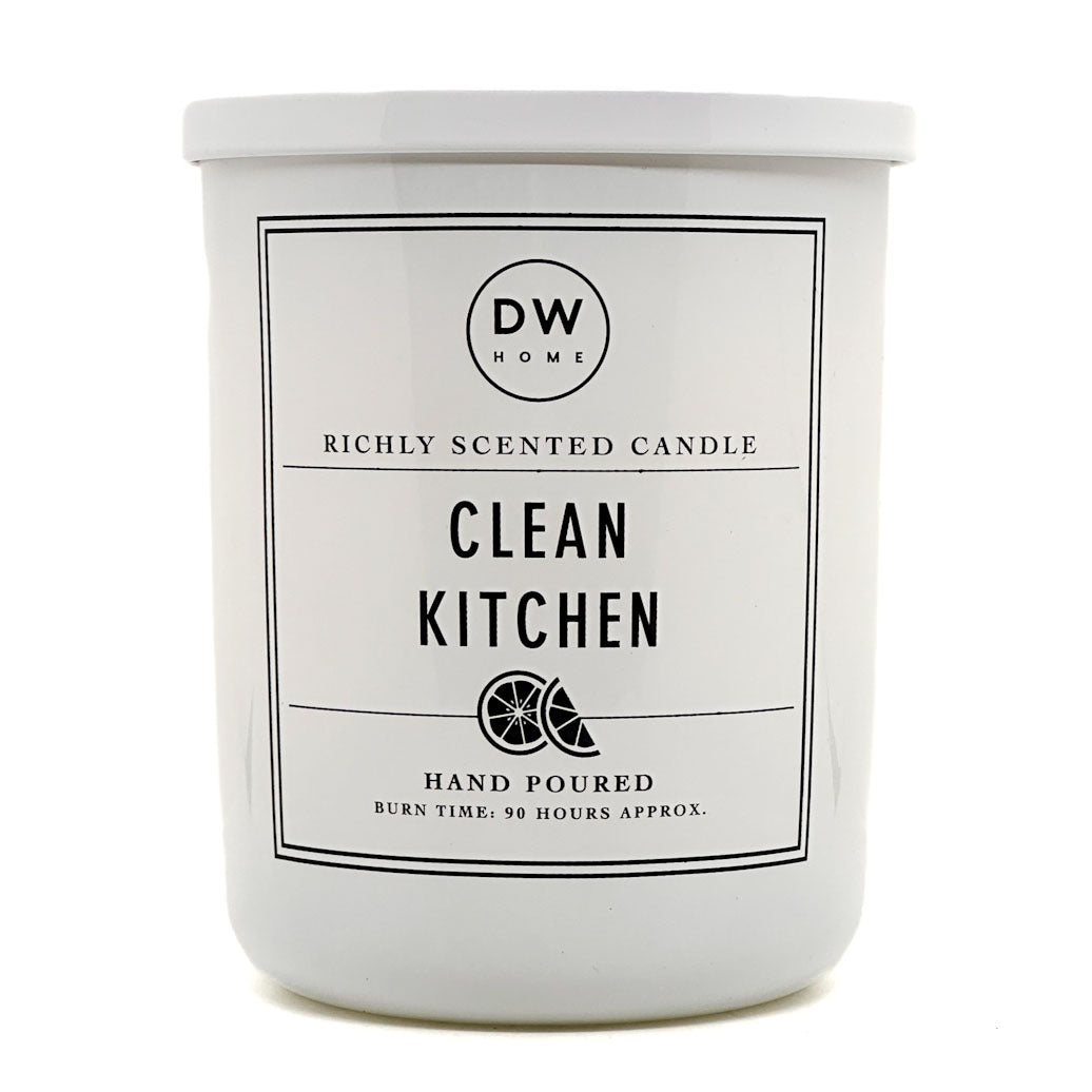 Clean Kitchen white candle with DW Home branding on a white background
