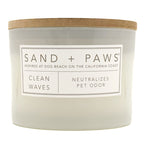 Clean Waves Candle with 'Sand + Paws' label on a white background