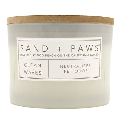 Clean Waves Candle with 'Sand + Paws' label on a white background