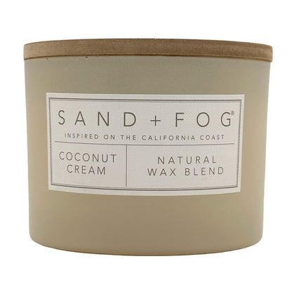 Coconut Cream Candle with 'Sand + Fog' label on a white background