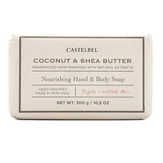 A wrapped bar of Castelbel Coconut & Shea Butter Nourishing Hand & Body Soap on a plain white background.