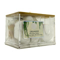 Clear plastic organiser with cotton swabs, cotton balls, and cotton pads on a white background