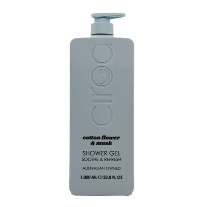 A 1000 mL bottle of Ciroa Cosmetics cotton flower & musk shower gel, featuring a matte light grey-blue bottle with a matching pump dispenser, set against a plain white background.