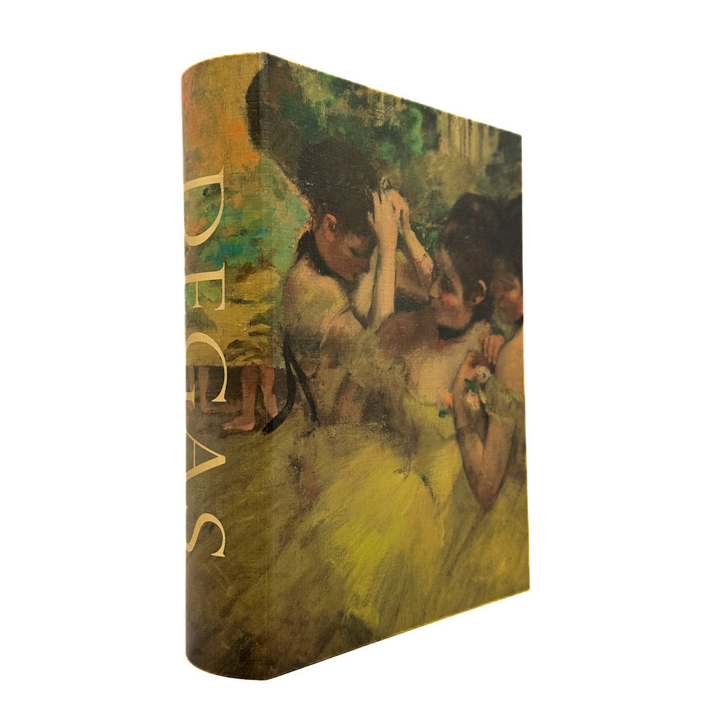 Book boxwith a cover featuring a painting of dancers, with 'Degas' text.